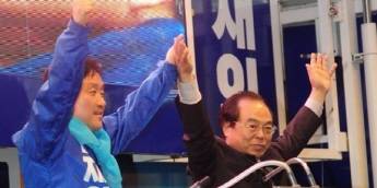 최인호 더불어민주당 의원(왼쪽)과 오거돈 부산시장. ⓒ 뉴스1